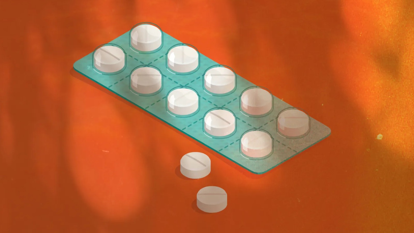 An image of white pills against an orange background
