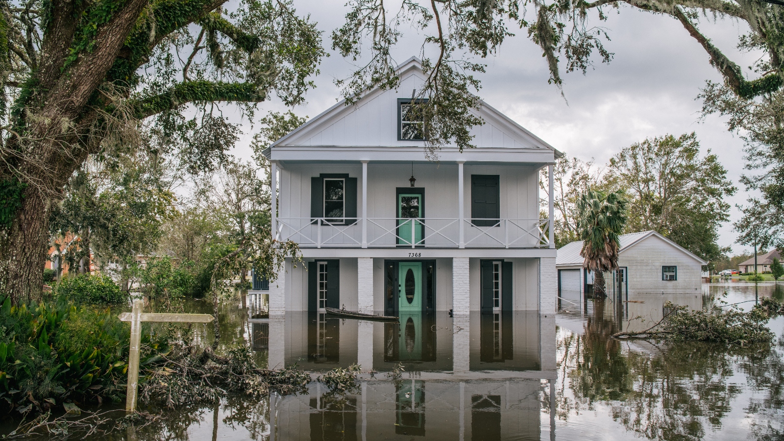 Floodwater surrounds a home on August 31, 2021 in Barataria, Louisiana after Hurricane Ida.