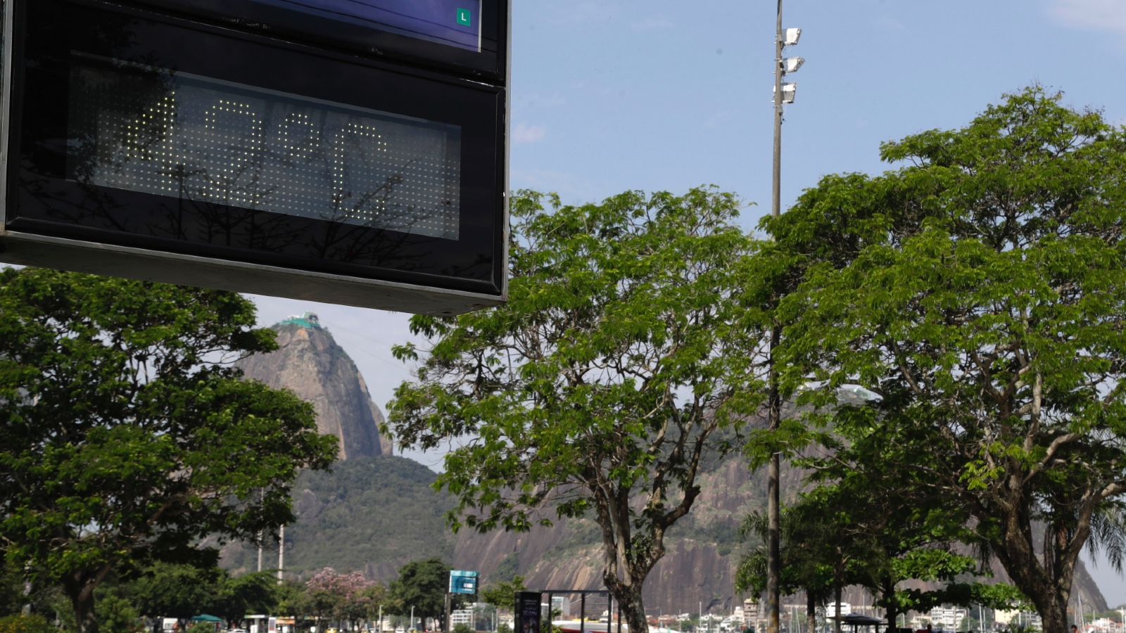 A thermometer reads 42 degrees Celsius during a rare winter heat wave in Brazil.