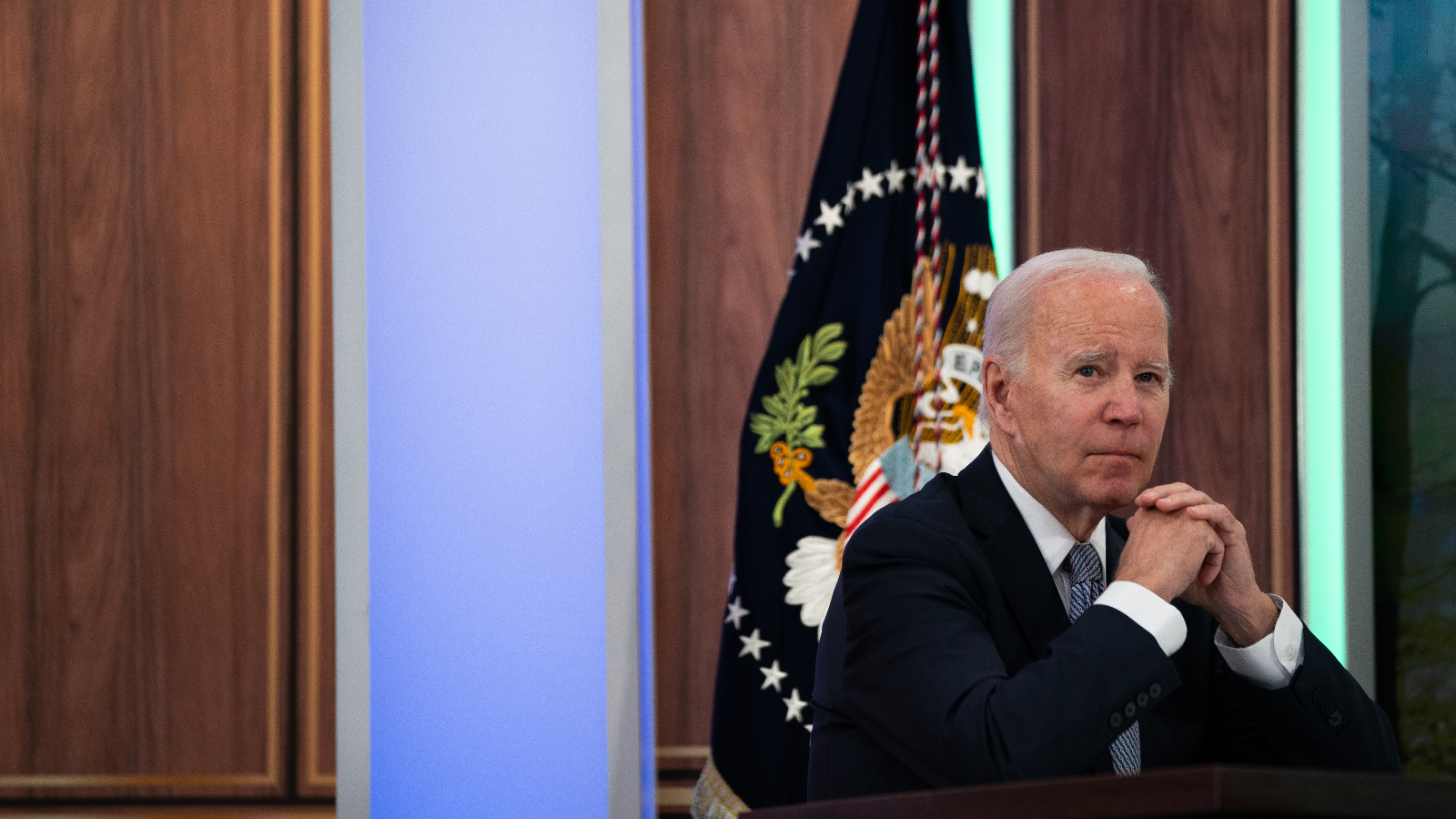 Photo of President Biden sitting at a podium