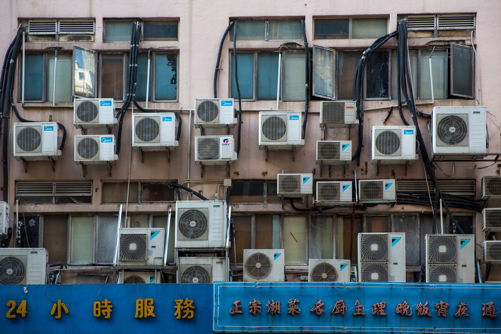 Wall mounted air-conditioning units adorning a building in Hong Kong