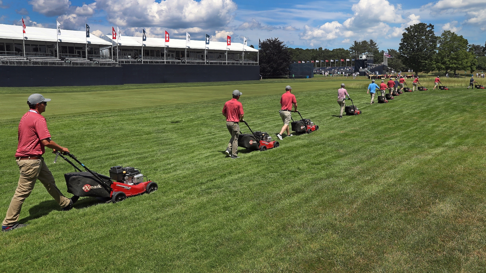 About 19 lawn mowers prepare for the US Open at The Country Club in Brookline, MA, on June 13, 2022.