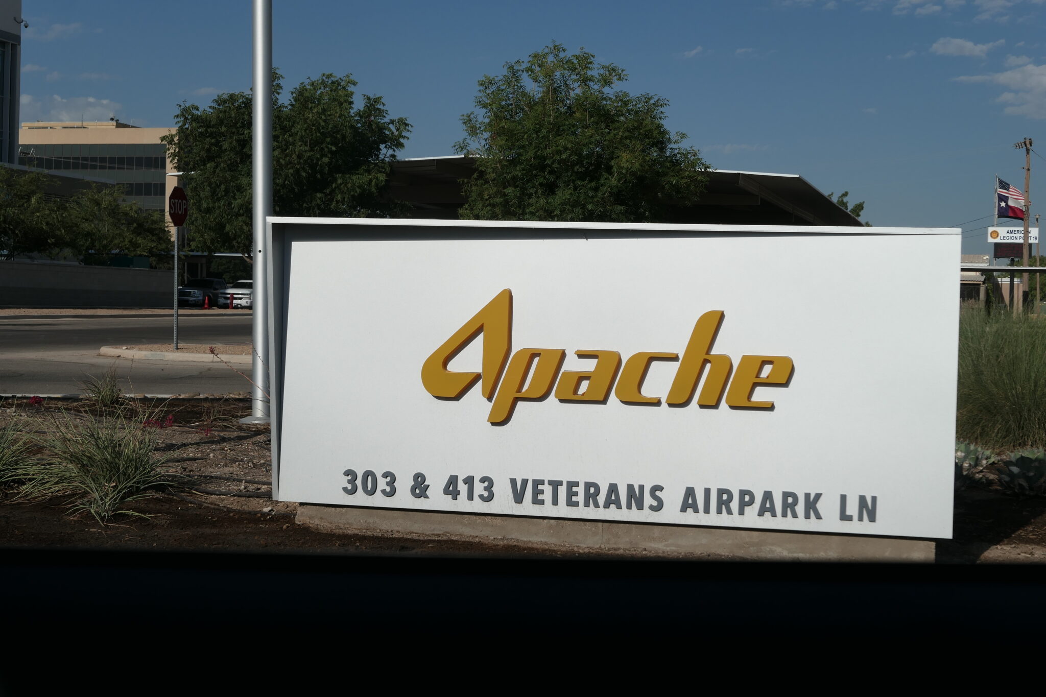 A sign that reads Apache.