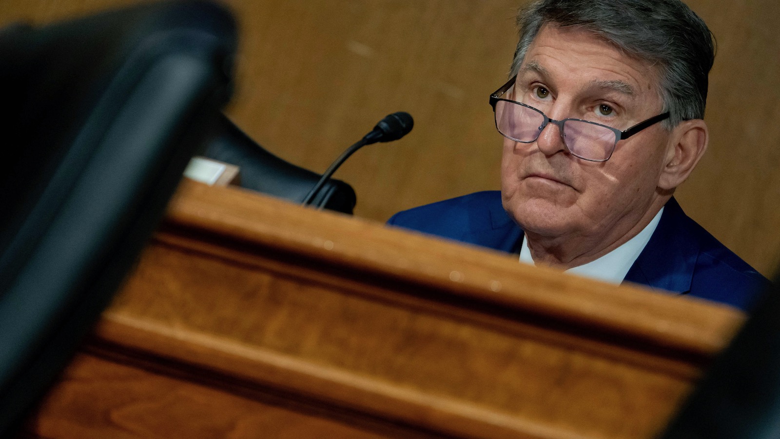 Senator Joe Manchin is seen behind a desk during a hearing of the US Senate Appropriations Committee.