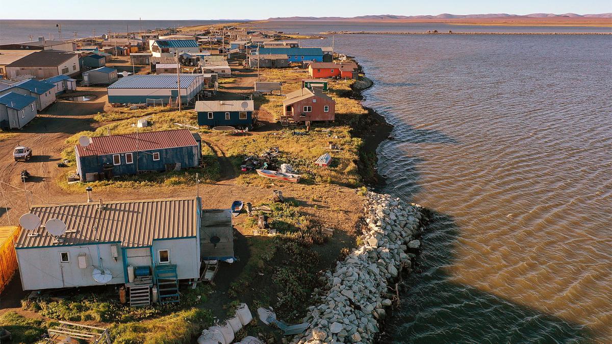 aerial view of Alaskan village with eroding coastline