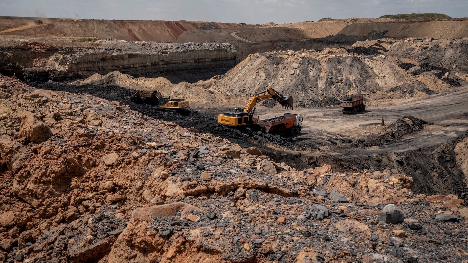 Mining vehicles are seen at a coal mine in Mpumalanga Province, South Africa.