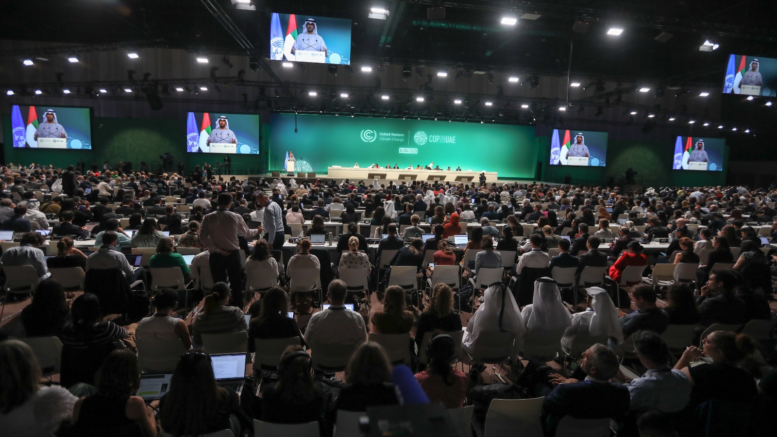 Participants attend day thirteen of the COP28 climate conference on December 13, 2023 in Dubai. The conference went into an extra day as delegations continue to negotiated over the wording of the final agreement.