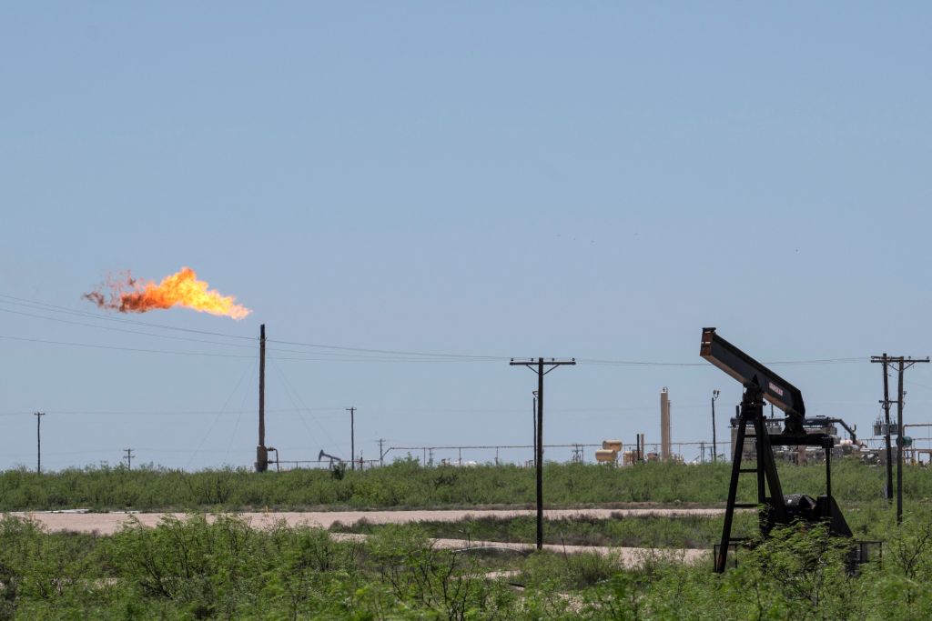 Flare stack in an oil field