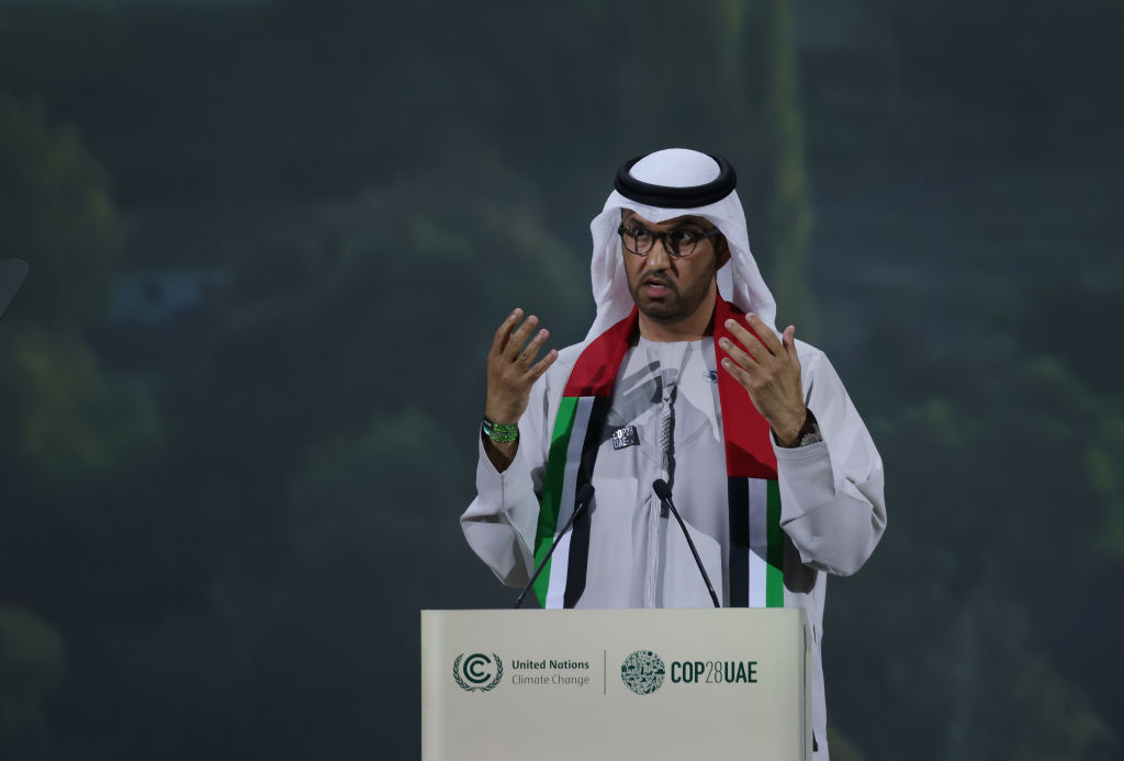 Sultan Al Jaber at a podium