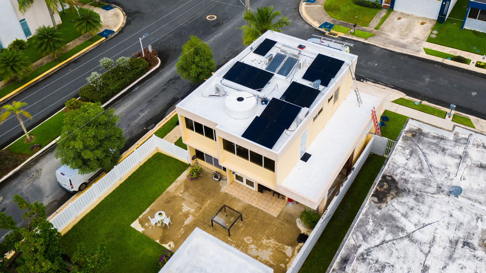 yellow house rooftop solar panel