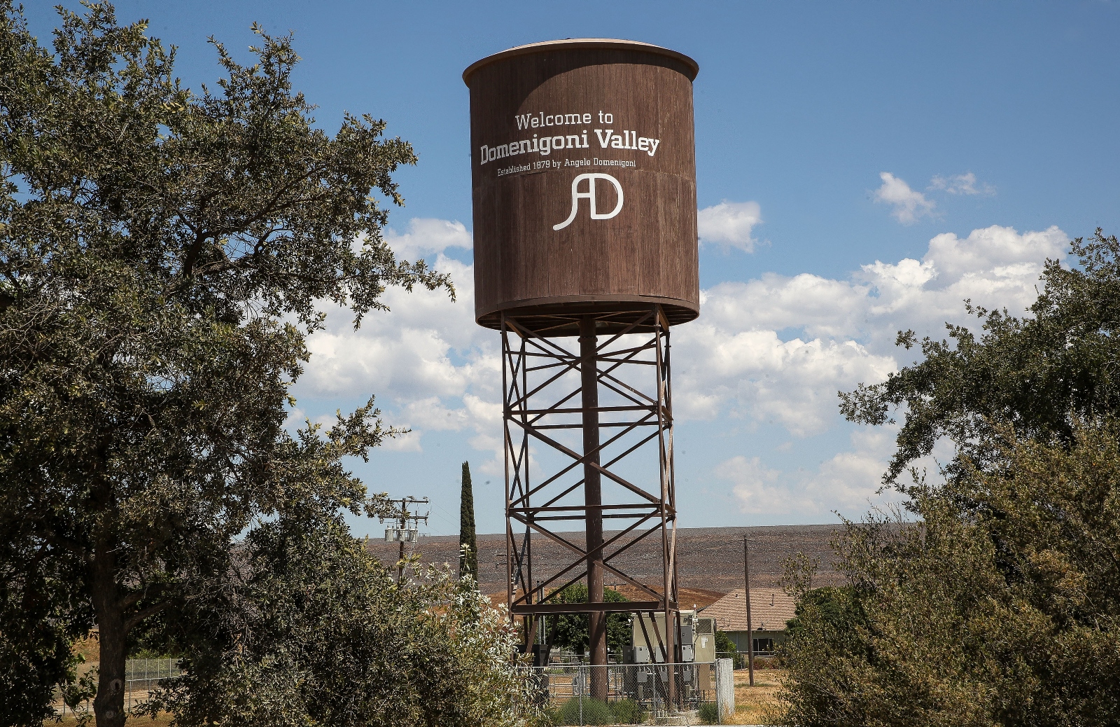 A sign on a tower in Winchester, California, welcomes people to the Domenigoni Valley