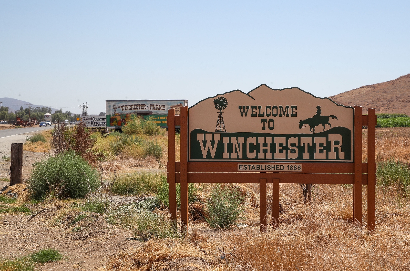 A welcome sign on the roadside for Winchester, California