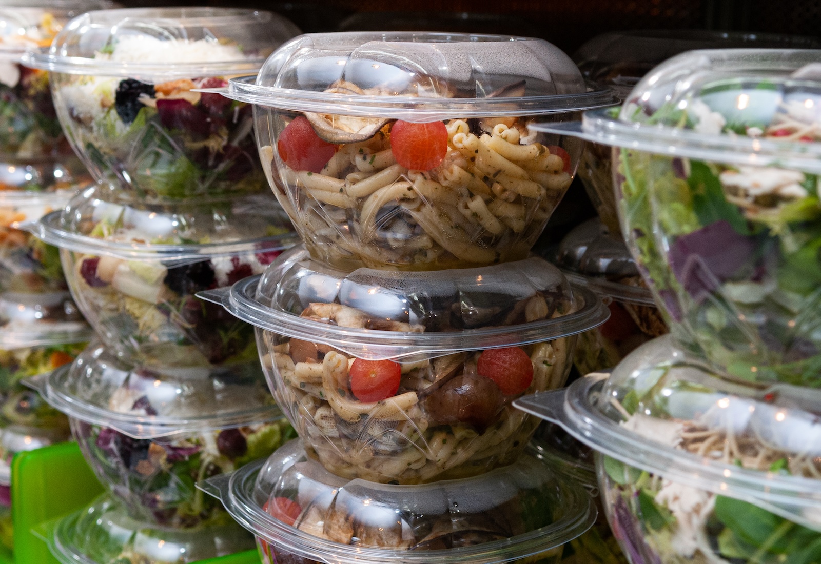 Salads packed in plastic clamshells