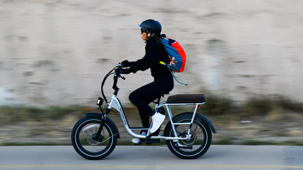 Woman riding an electric bike in Denver