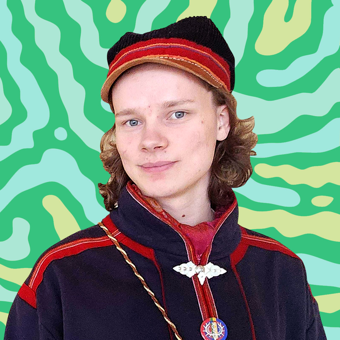 A headshot of a young person in a dark blue and red jacket on a green and yellow striped background