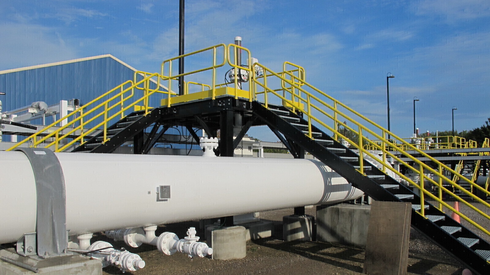 An above-ground section of Enbridge's Line 5 pipeline at Michagan's Mackinaw City pump station sits in 2016.