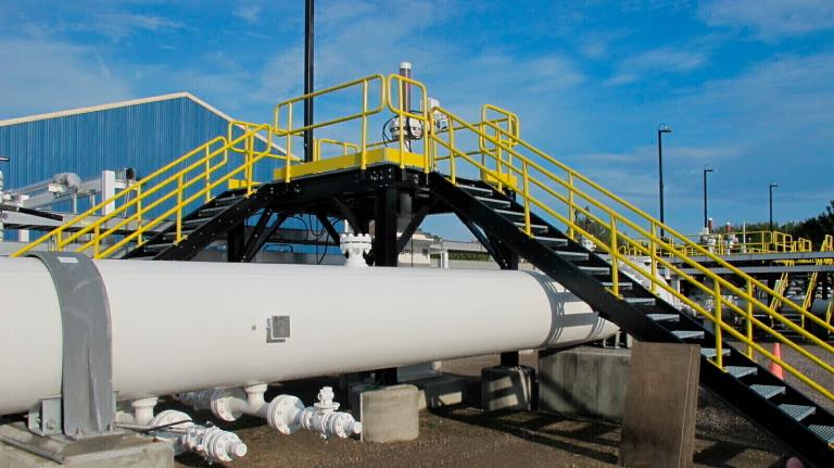 An above-ground section of Enbridge's Line 5 pipeline at Michagan's Mackinaw City pump station sits in 2016.