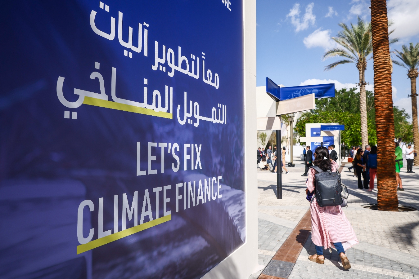 Blue banner that says "Let's fix climate finance"