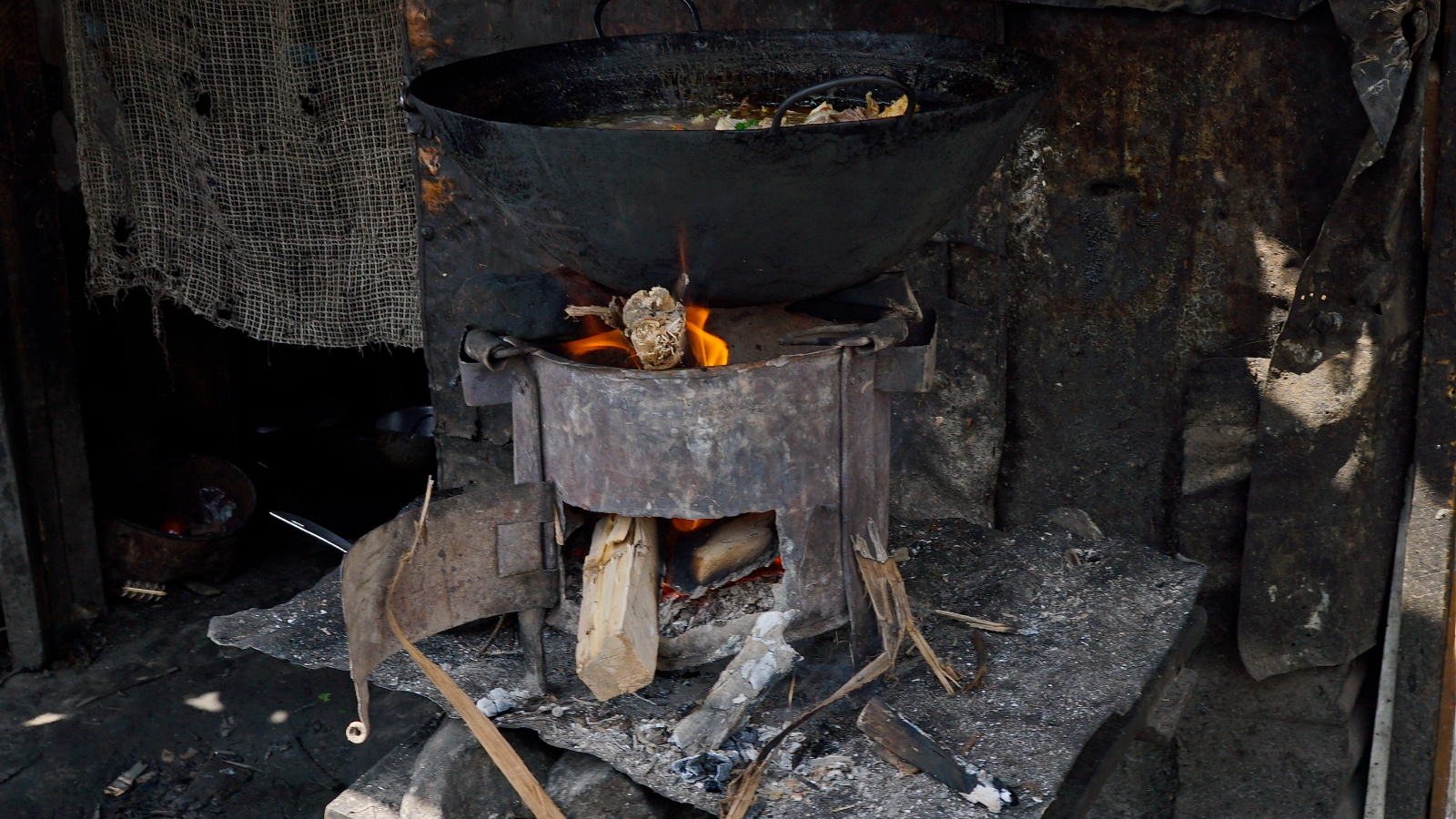 Food cooking over a wood-fired stove in the Mathare slums of Nairobi, Kenya, in 2015.