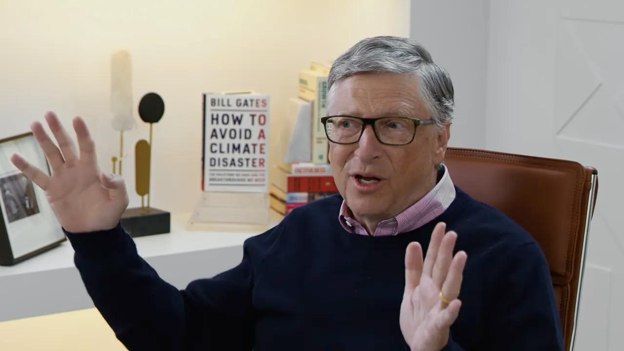 Bill Gates uses his hands to speak in a still frame from a video.