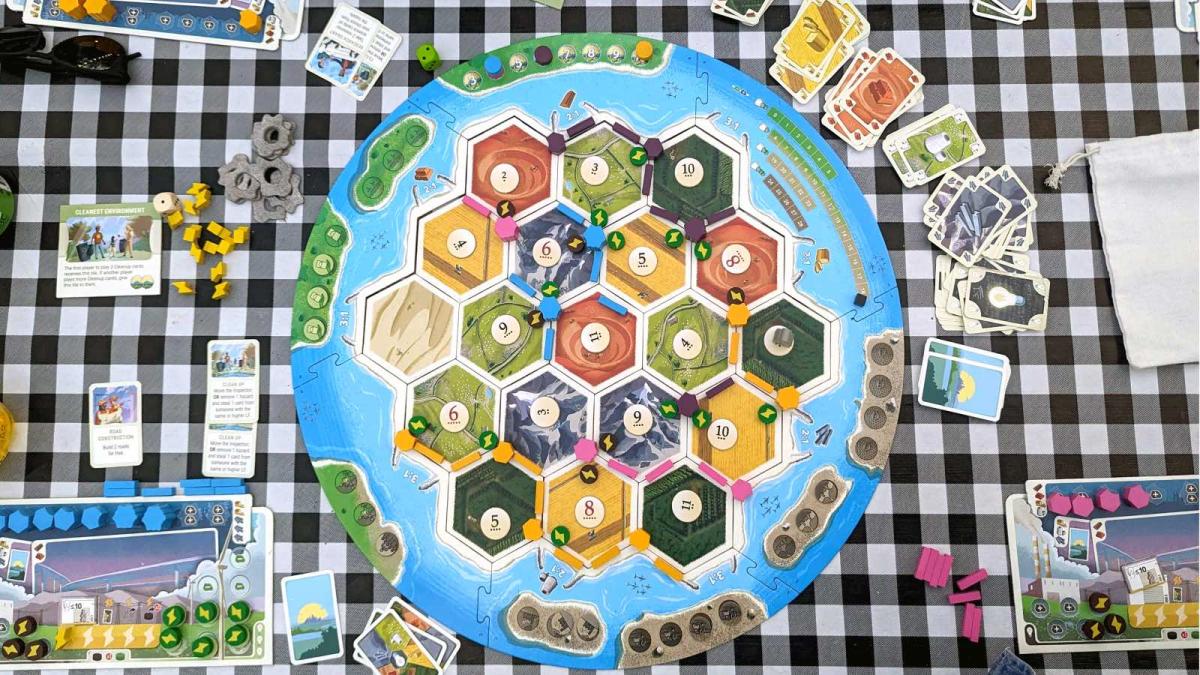 A bird's eye view of the Catan New Energies board setup on a table