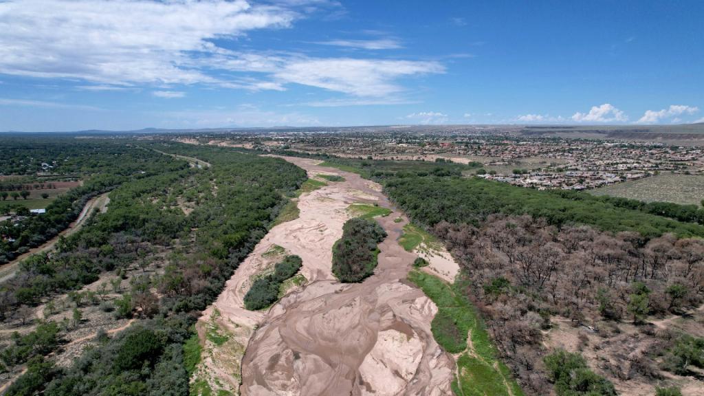 The dry Rio Grande riverbed is seen from the air near Albuquerque, New Mexico, in 2022.