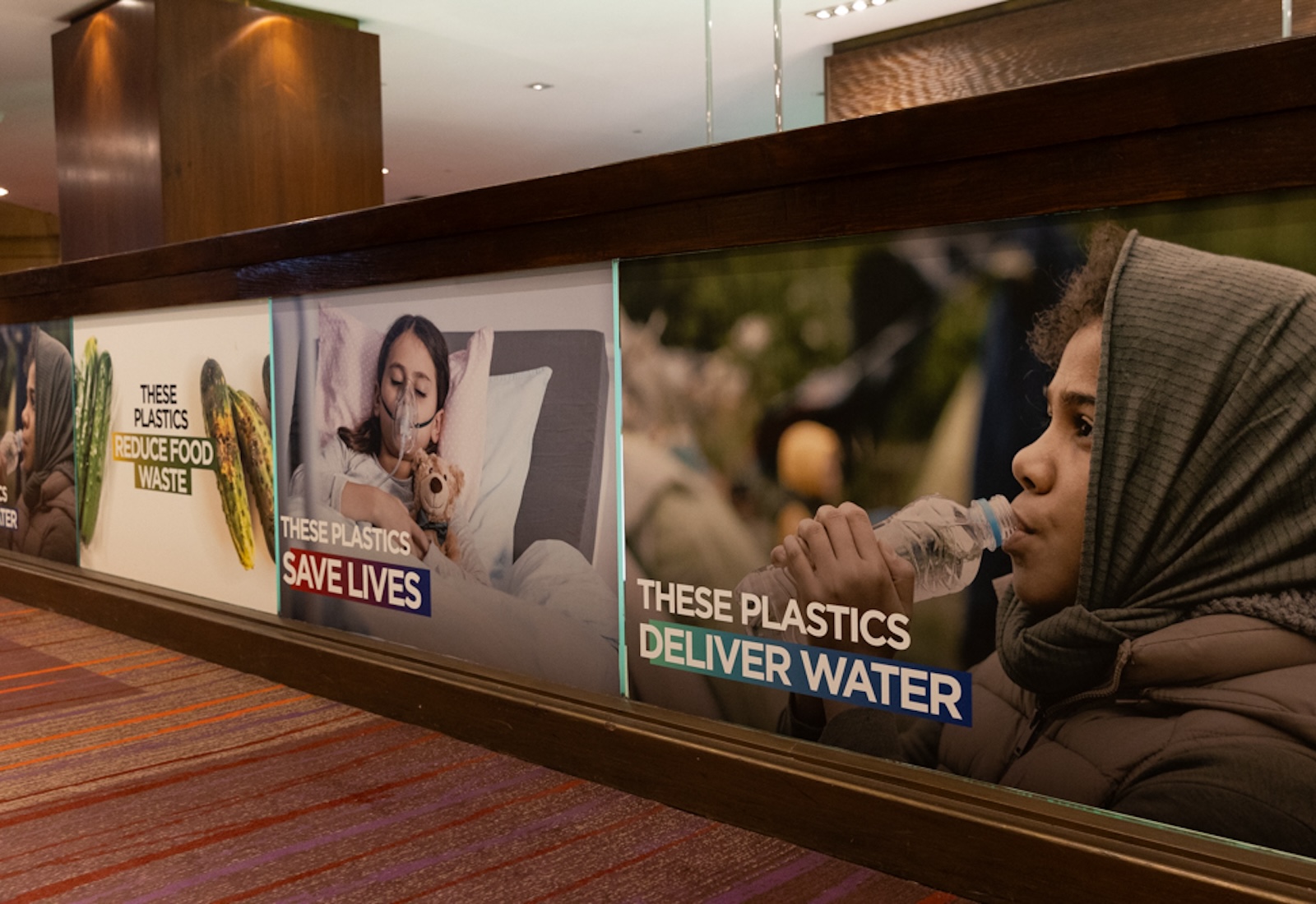 A panel of ad posters reading "These plastics deliver water" and "These plastics save lives"