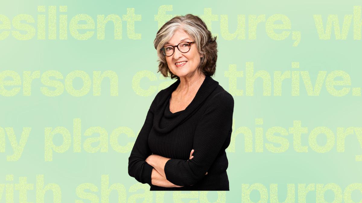 Author Barbara Kingsolver on a light green background with lighter green words behind her