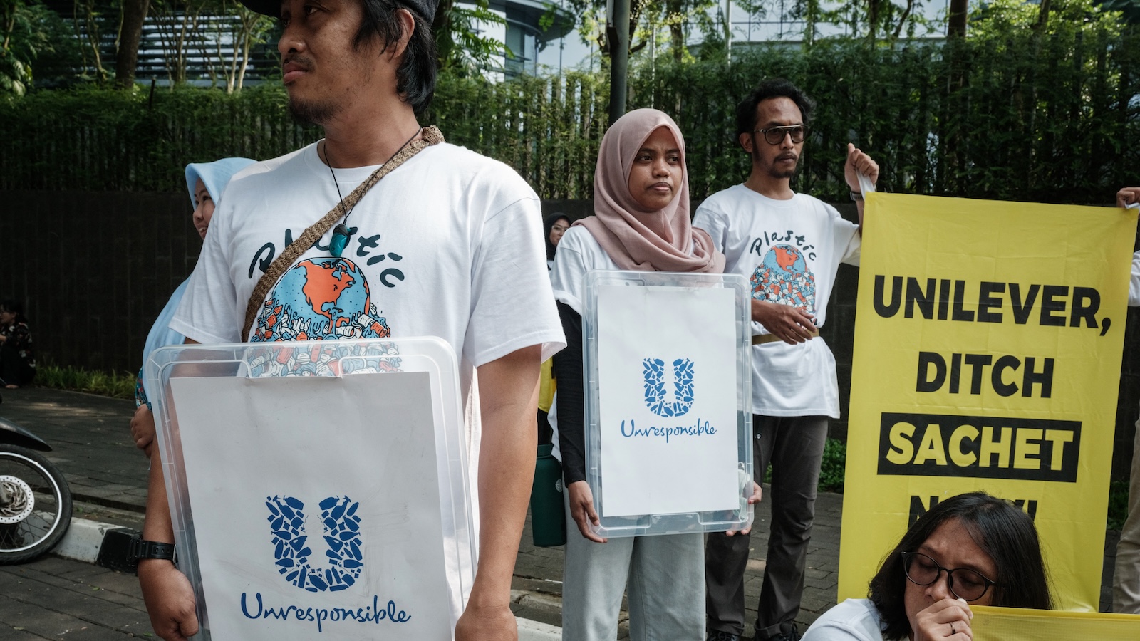 Members of Greenpeace Indonesia stage a protest against the plastic waste generated by Unilever's products outside the company's office in Tangerang, a suburb of Jakarta, on June 20.