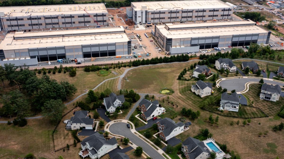 An Amazon Web Services data center situated near single-family homes in Stone Ridge, Virginia. Northern Virginia is the largest data center market in the world.