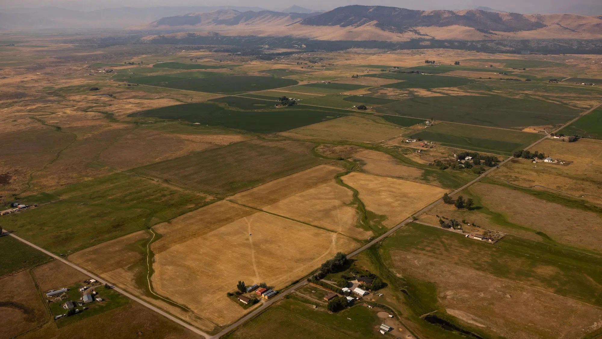 An aerial view of the Flathead Reservation showing a checkerboard of parcels owned by different entities