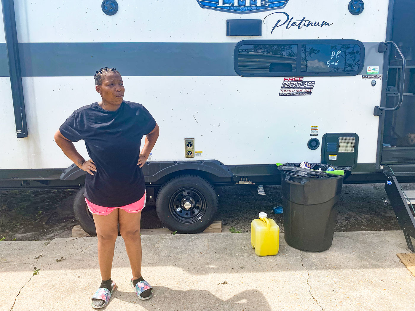 Chelsy Robison stands in front of her FEMA-issued trailer home in Paradise Park, a mobile home in Perry, Florida. Robison has been living in the trailer park since a few months after last year's Hurricane Idalia, and her home narrowly avoided damage during last month's Hurricane Helene.