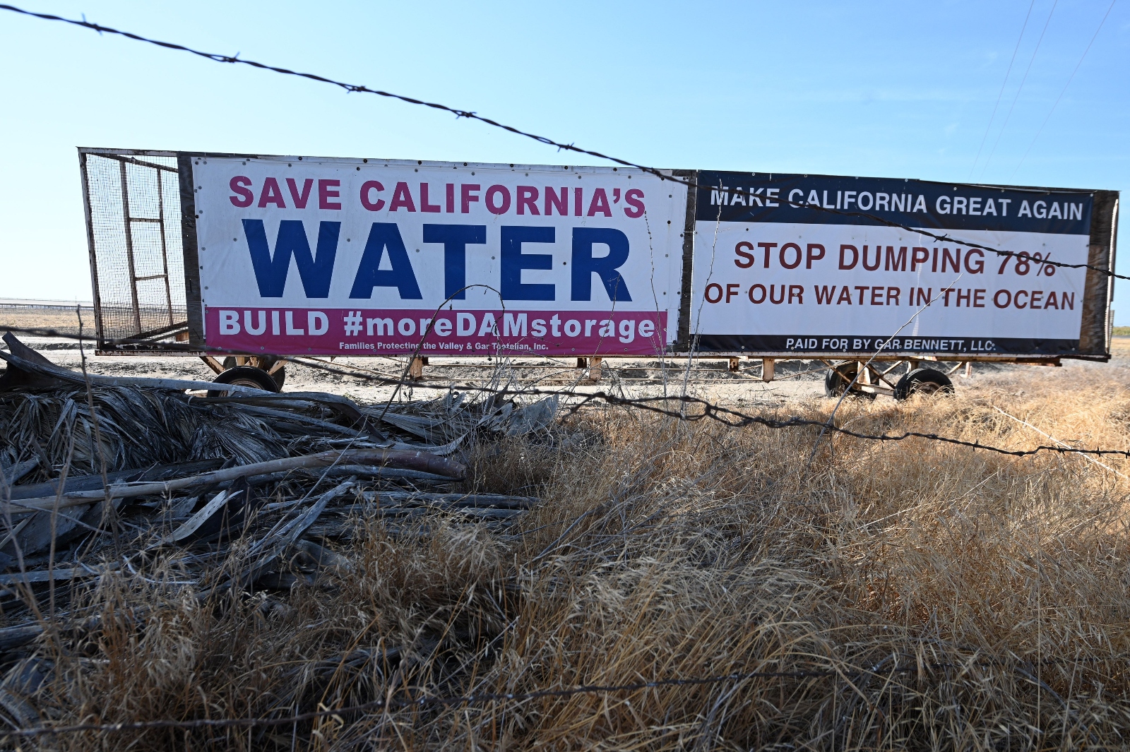 A sign in California's Central Valley calls for the construction of more dams that can store irrigation water for farmers. The signs, paid for by a local fertilizer magnate, are visible along Interstate 5 in much of the valley.