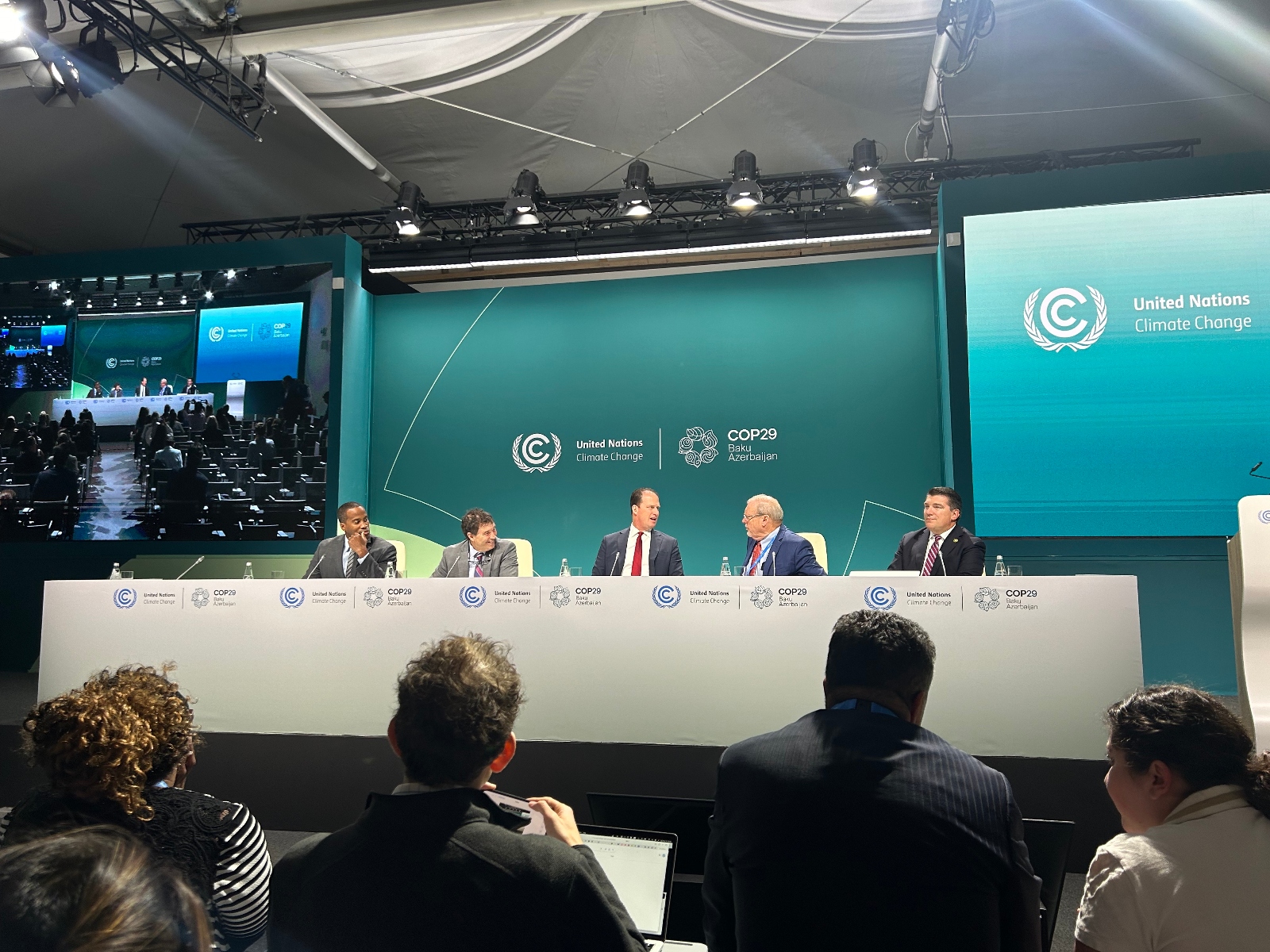 Rep. August Pfluger, Republican of Texas (center) holds a press conference at COP29 in Baku along with four other Republicans. The congressmen mounted a strong defense of fossil fuels and questioned the Inflation Reduction Act.