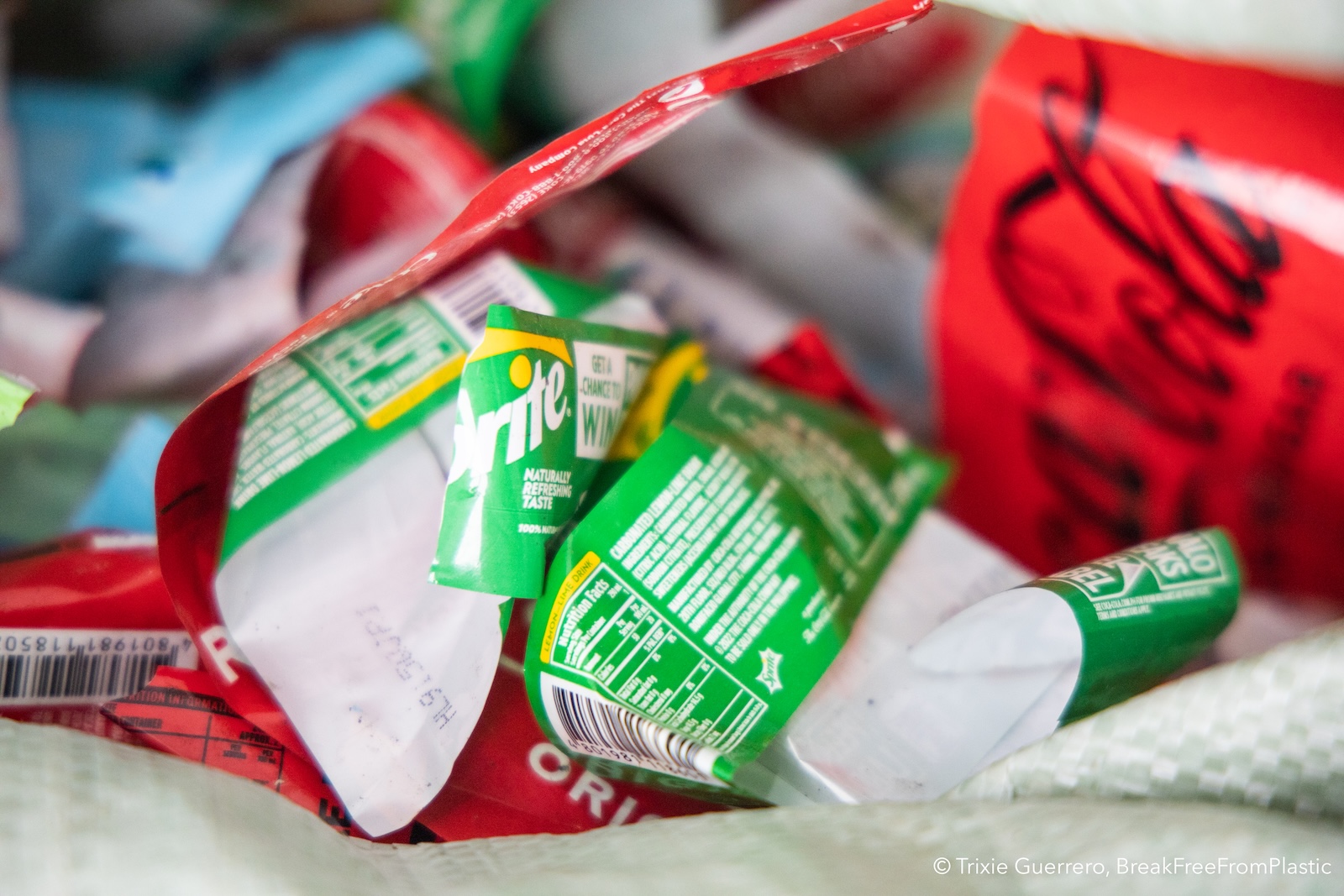 Close up of Coke and Pepsi bottle wrappers