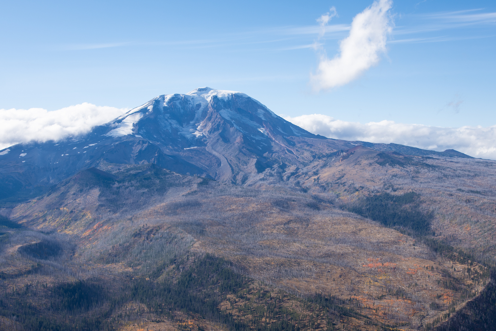 a mountain landscape under blue sky