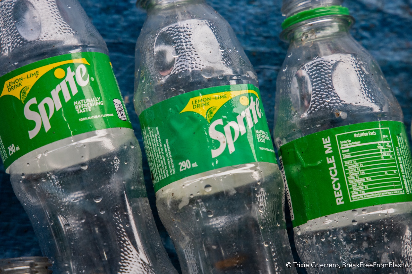 Close-up of empty Sprite bottles