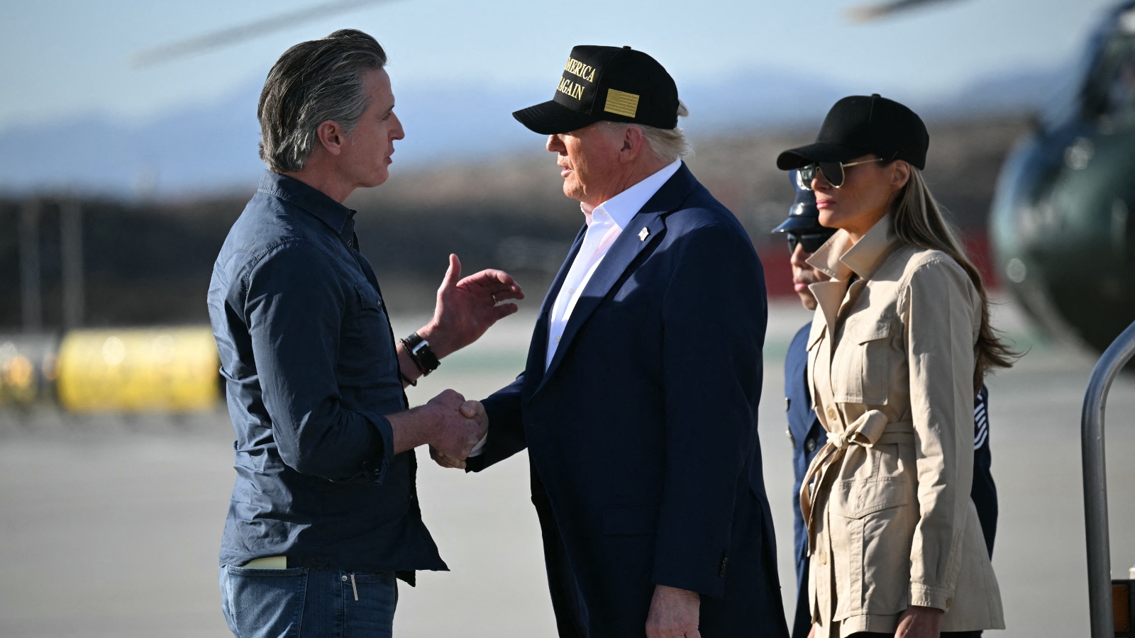 President Donald Trump shakes hands with California Governor Gavin Newsom upon his arrival in Los Angeles to visit the region devastated by the Palisades and Eaton fires.