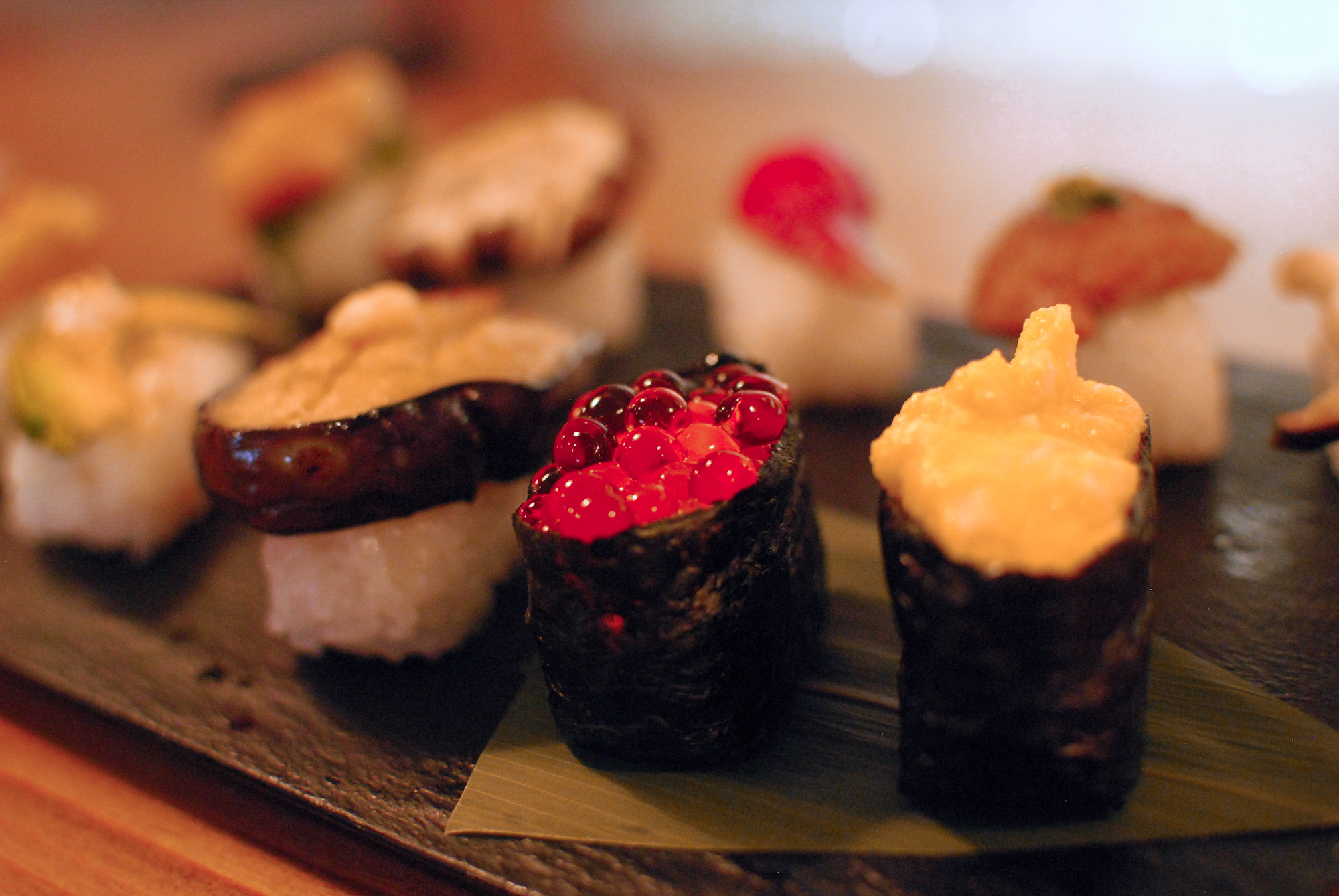 a closeup of sushi on a platter