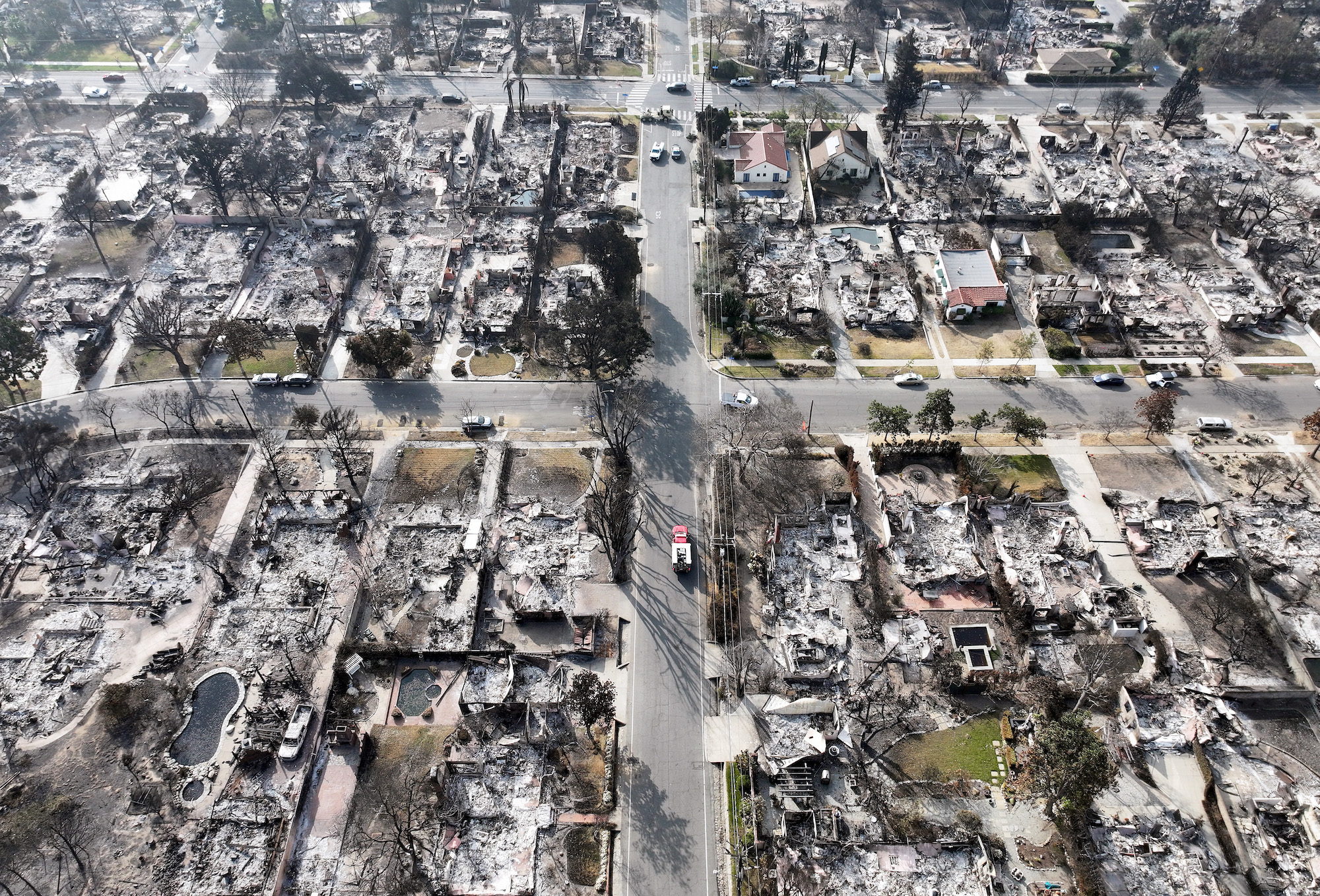 An aerial view of a burned neighborhood