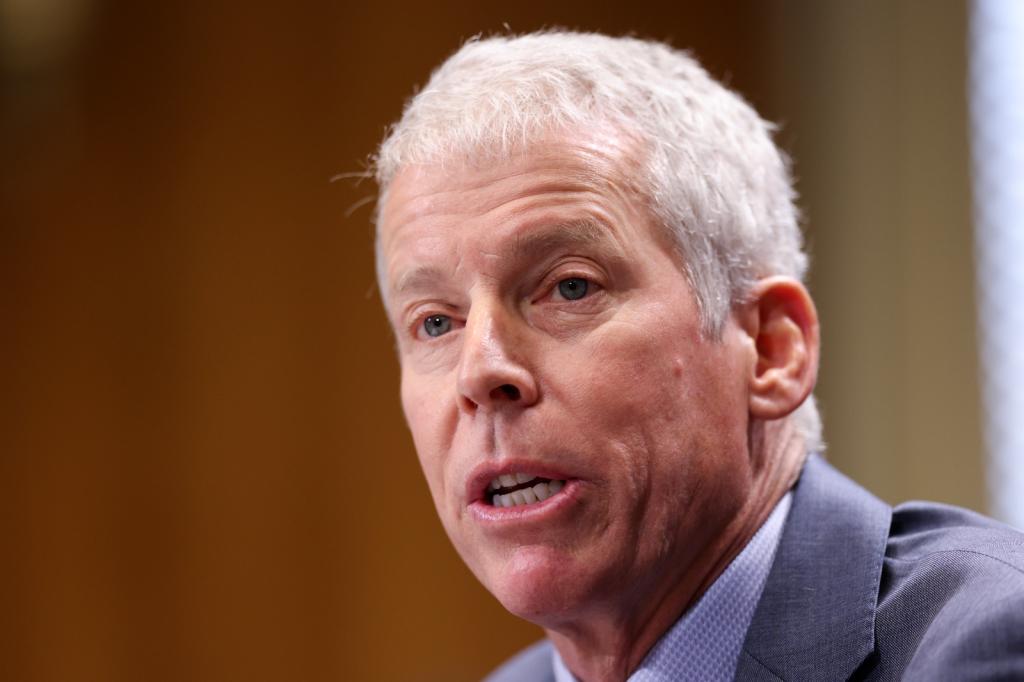 Close-up of Chris Wright mid-sentence.