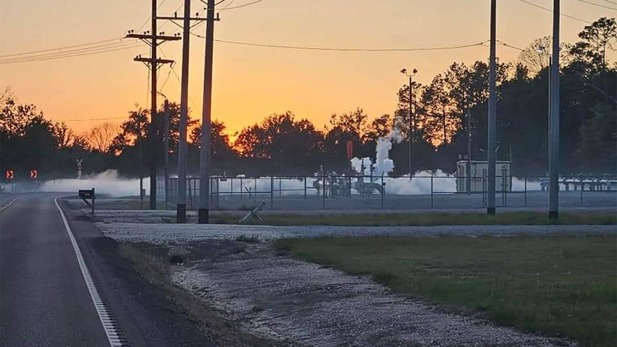 Vapor gathering above a road from a pipeline leak