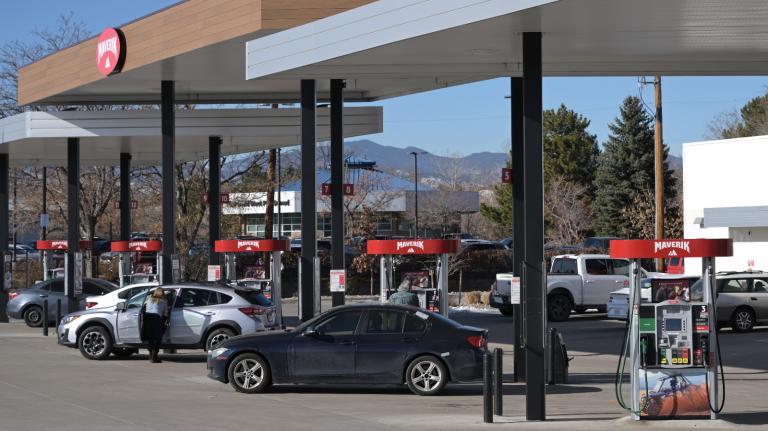 Cars are pulled into a gas station