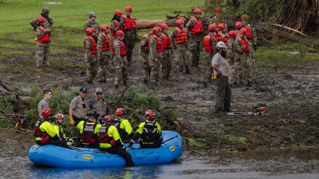 Search and recovery workers dig through debris looking for any survivors or remains of people swept up in the flash flooding at Camp Mystic on July 6, 2025 in Hunt, Texas.