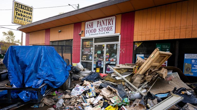 Debris in front of a hurricane-damaged store in Asheville, North Carolina