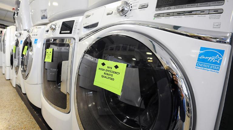 A row of energy-star-certified washing machines.