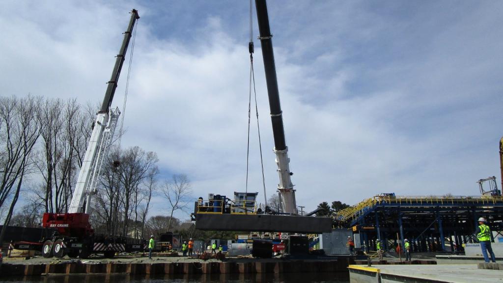 Two cranes loom over a construction site