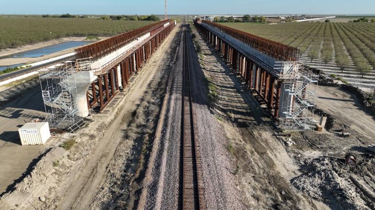 Flood waters from recent storms and river runoff surround the construction site of the Tule River high-speed rail viaduct near Highway 43 and Avenue 144 south of Corcoran, California.