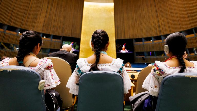 Three Indigenous women attend the opening of UNPFII 2025