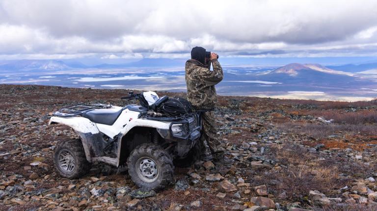 A Gwich'in hunter keeps an eye out for the Porcupine caribou herd just outside the Arctic National Wildlife Refuge in Alaska.